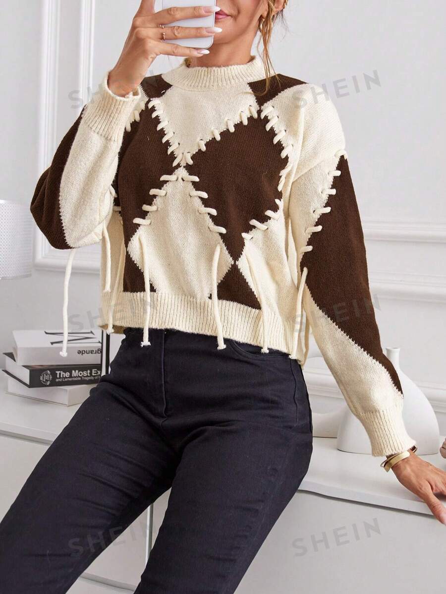 Aveloria Jersey con patrón de rombo de hombros caídos ribete con fleco