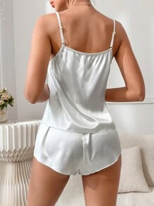 SilkySpell Conjunto de pijama con top tipo camiseta y pantalón corto de satén liso en color blanco, ideal para vacaciones