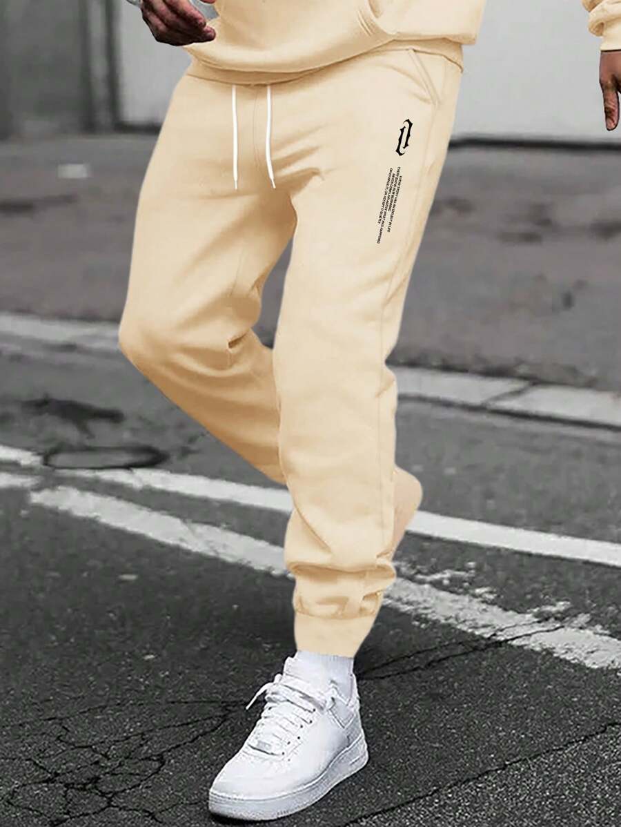Manfinity Homme Nam Lỏng lẻo phù hợp Quần thể thao Với In Khẩu hiệu Và Eo dây rút - Màu Khaki - Xem 1