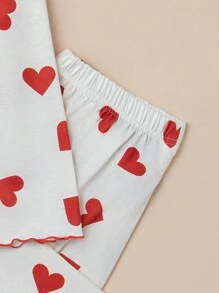 Chica adolescente Conjunto de pijama pantalones con camiseta con estampado de corazón
