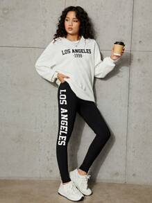 青少年女孩字母圖案落肩袖連帽衫和緊身褲 - 黑與白 - 查看 1