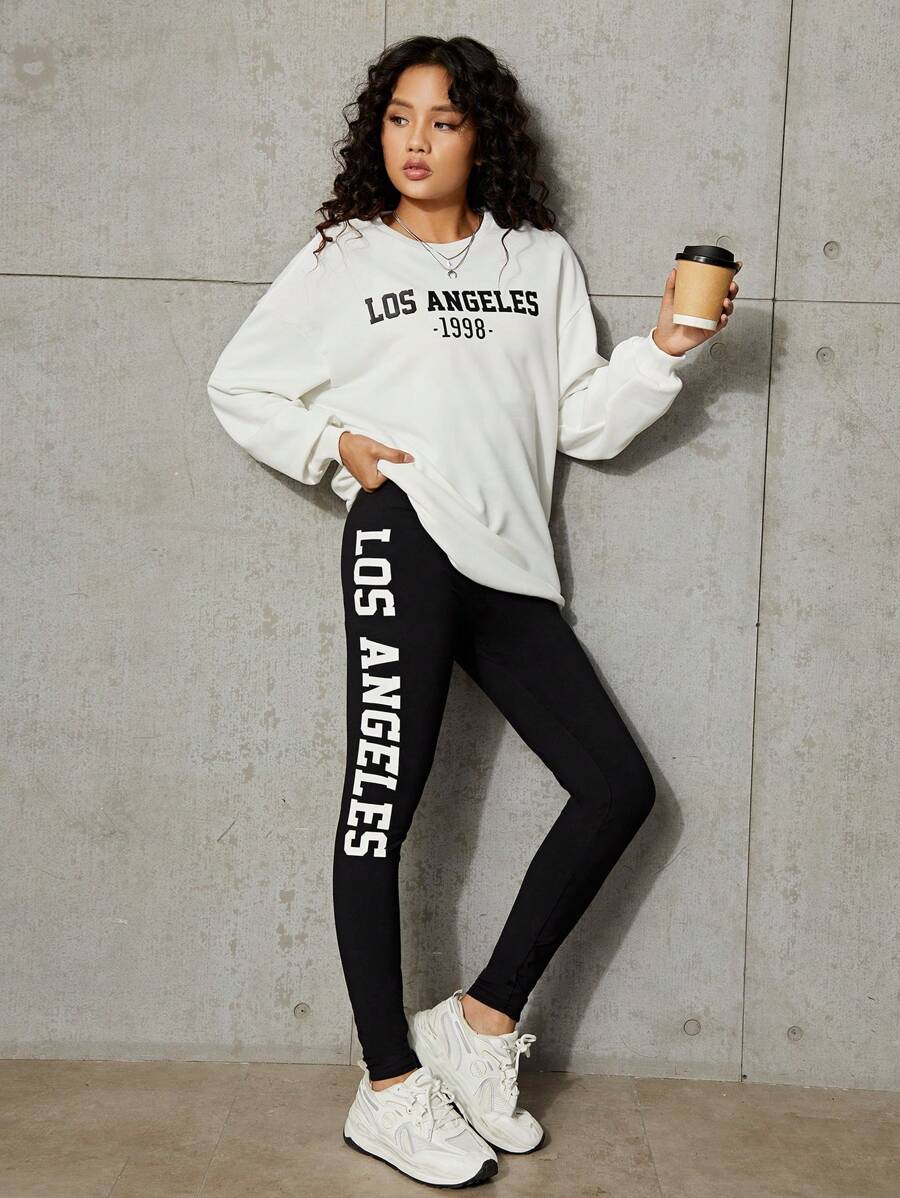 青少年女孩字母圖案落肩袖連帽衫和緊身褲 - 黑與白 - 查看 1