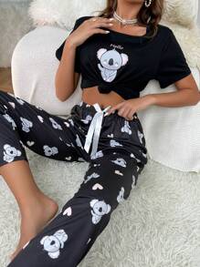 Conjunto de pijama con camiseta estampado de dibujos animados y pantalones