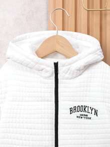 SHEIN Casaco acolchoado com capuz e bolso com aba bordado com letras e zíper para menino pré-adolescente