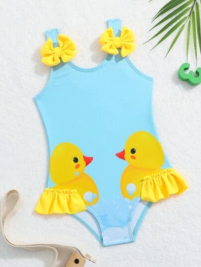 SHEIN GraphicGems Baby Girl Cartoon Graphic Bow Front Ruffle Trim One Piece Swimsuit