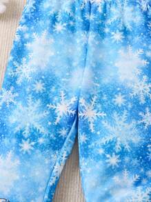 SHEIN Young Girl Figure Graphic Snowflake Print Flare Leg Pants