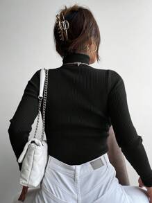 RueChic Jersey unicolor cuello alto tejido de canalé