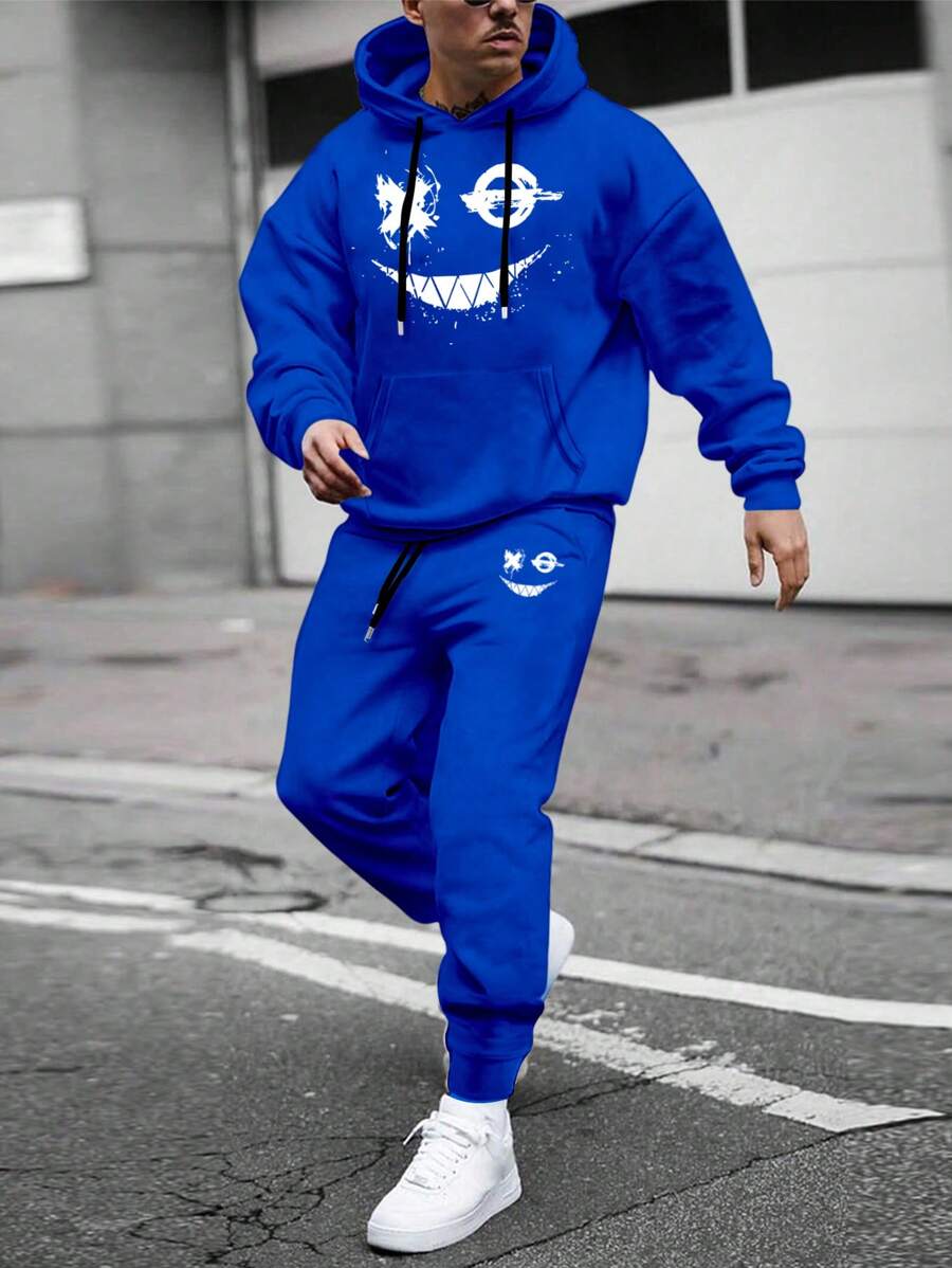 Manfinity EMRG Bộ quần jogger và áo hoodie có dây rút hình mặt cười hoạt hình cho nam - Màu xanh lam - Xem 1