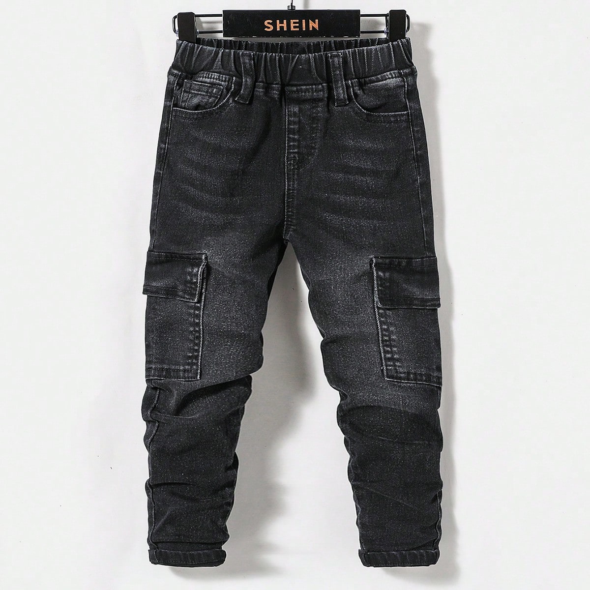 Pantalones de cargo de mezclilla con bolsillos que se voltean para niños