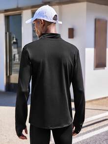 Manfinity Sport Corelite Áo khoác thể thao nam có họa tiết chữ cái quý Zip - màu đen - Xem 2