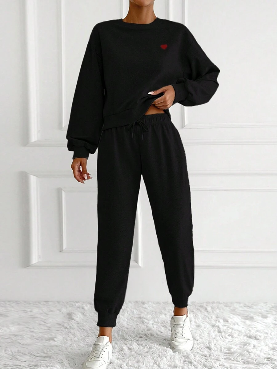 EURMUSE Women's Heart Print Drop Shoulder Sweatshirt And Joggers Set - Black - View 1