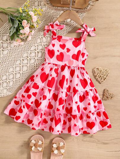 SHEIN Elladie kids Vestido informal de verano para niña con estampado de corazones completo, sin mangas, con volantes y lazo en el bajo, sencillo y cómodo