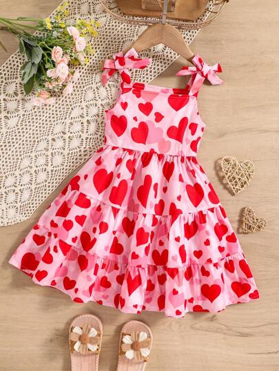 SHEIN Elladie kids Vestido informal de verano para niña con estampado de corazones completo, sin mangas, con volantes y lazo en el bajo, sencillo y cómodo