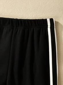 SHEIN Conjunto Casual De Sudadera Con Capucha Y Pantalones Acampanados Impresos Para Chicas Pre-adolescentes