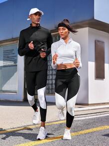 Manfinity Sport Corelite Áo khoác thể thao nam có họa tiết chữ cái quý Zip - màu đen - Xem 1