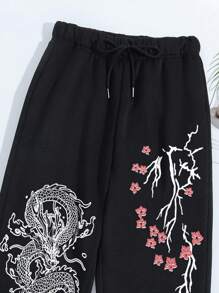 INAWLY 女士有彈性腰圍和腳踝束緊運動長褲,印有花朵和龍紋