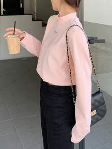 DAZY Áo thun cổ tròn tay dài họa tiết chữ cái dành cho nữ - Màu Hồng baby - Xem 4