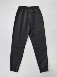 Manfinity Homme Pantalones con cordón en la cintura para hombres, pantalones ajustados con cordón en la cintura para hombres, pantalones jogger para hombres, color negro, otoño - Negro - Ver 2