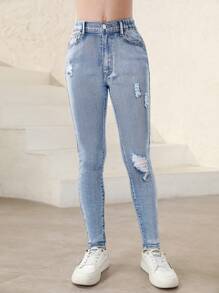 Jeans de mezclilla elásticos para niña preadolescente con efecto desgastado - Azul lavado medio - Ver 1