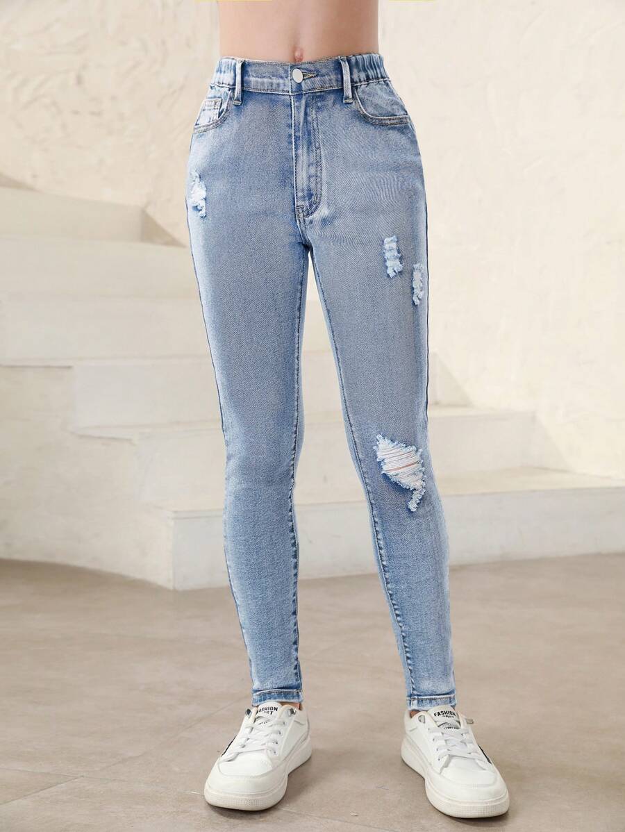 Jeans de mezclilla elásticos para niña preadolescente con efecto desgastado - Azul lavado medio - Ver 1