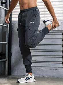 Manfinity Sport Corelite Men's Letter Print Drawstring Jogger Pants With Cargo Pockets