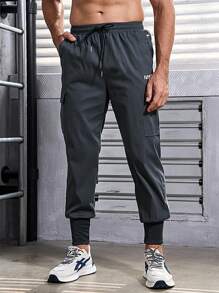 Manfinity Sport Corelite Men's Letter Print Drawstring Jogger Pants With Cargo Pockets