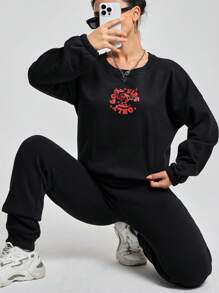 EURMUSE Women's Printed Sweatshirt And Joggers Two-piece Set - Black - View 1