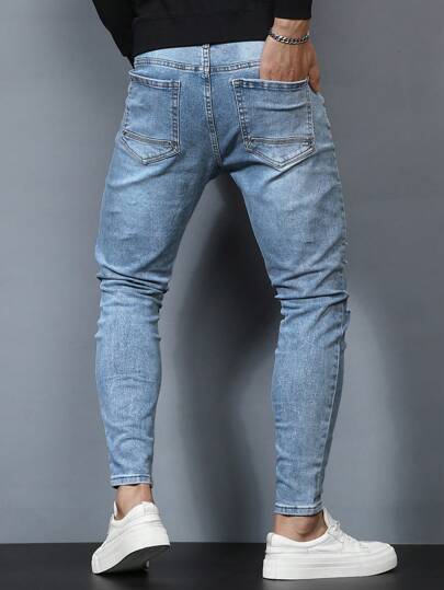 Jeans De Mezclilla Para Hombres Con Cierre De Cremallera Y Aspecto Envejecido Y Con La Parte Frontal Abierta