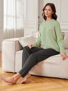 Casual Regular Sleeve Letter Print Round Neck Baby Blue Pajama Pant Set For Women With Pocket Details And Slight Stretch Fabric