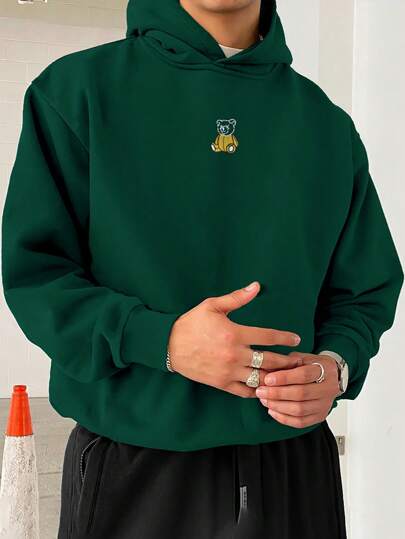 Manfinity Homme sweat-shirt à capuche ample pour hommes avec motif graphique de dessin animé, automne