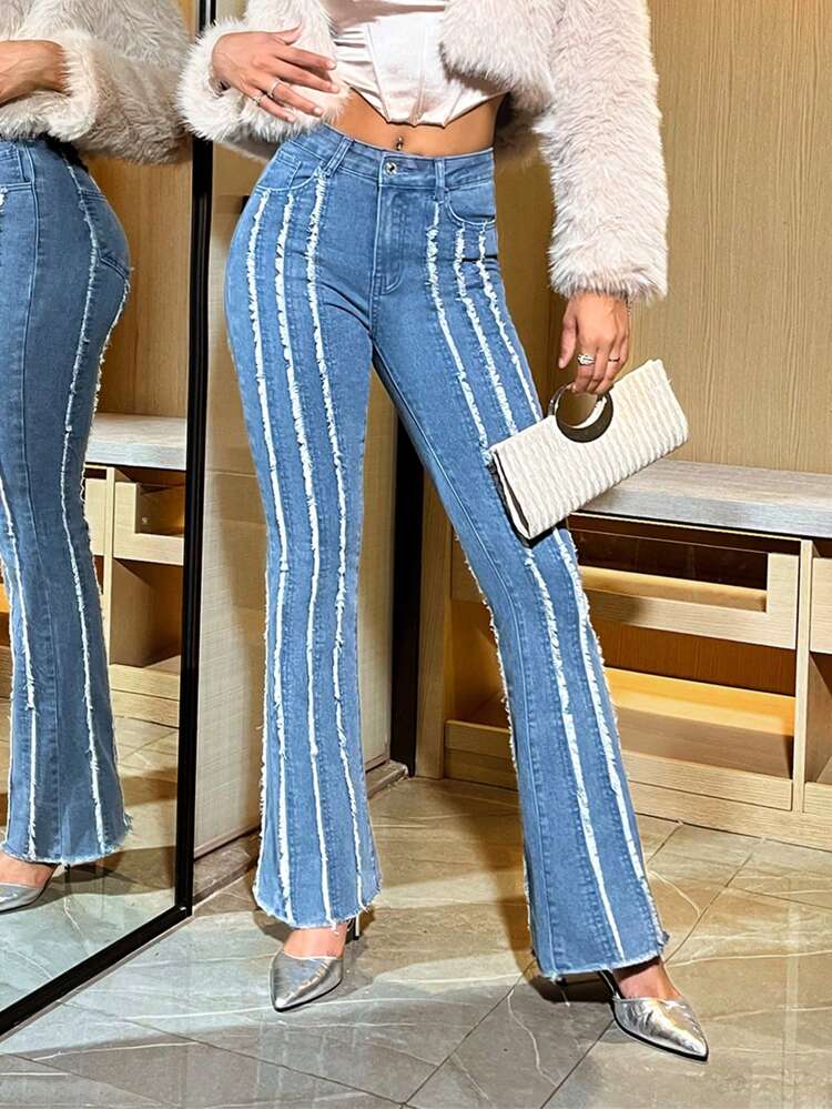 Flared Jeans With Frayed Hem