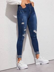 SHEIN Essnce Pantalones Vaqueros De Corte Slim Rasgados