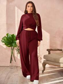 SHEIN Essnce Conjunto De Dos Piezas De Talla Grande Para Mujer Con Camiseta Cruzada En El Dobladillo Y Pantalones Largos
