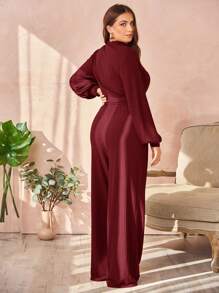 SHEIN Essnce Conjunto De Dos Piezas De Talla Grande Para Mujer Con Camiseta Cruzada En El Dobladillo Y Pantalones Largos