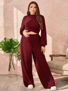 SHEIN Essnce Conjunto De Dos Piezas De Talla Grande Para Mujer Con Camiseta Cruzada En El Dobladillo Y Pantalones Largos