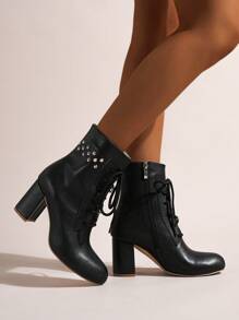 時尚女士派對和庞克風格鉚釘系带黑色中筒靴