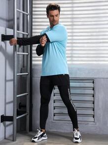 Manfinity Sport Corelite Ensemble de sport 2 en 1 pour homme avec lettrage graphique, costume d'athlétisme, ensemble d'entraînement de survêtement