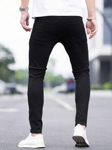 Manfinity Homme 男性磨損細身牛仔褲修身版型長洗水斑駁裝運貨運單一黑色破舊搖滾說唱