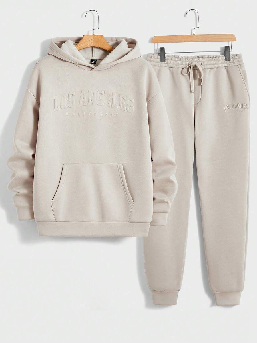 Manfinity RebelGame Nam Dây rút Đồ họa Chữ cái Hoodie Và Quần Chạy bộ Bộ - Màu be - Xem 1