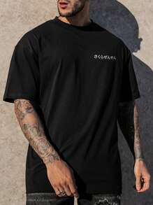 Manfinity Homme Camiseta de manga corta casual de talla grande para hombre con estampado floral y eslogan, para salir