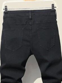 Manfinity Roughcore 男士純棉口號骷髏刺繡裸邊修身牛仔褲，緊身修身長款破洞毛邊牛仔褲，帶有貨運版型的純黑色平口青年牛仔褲，適合晚宴和搖滾演出、與好友出遊 - 黑色 - 查看 3