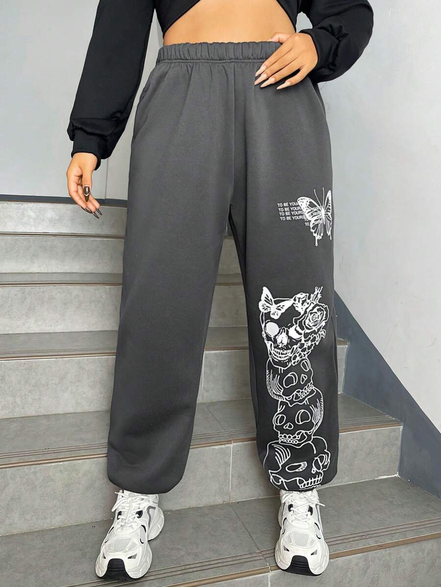 SHEIN EZwear Pantalones de chándal de talla grande con estampado de calaveras y mariposas - Gris Oscuro - Ver 1