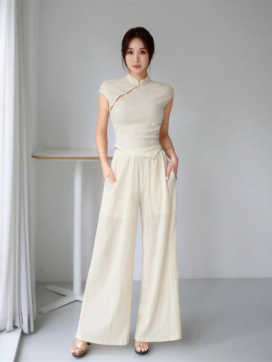 EastFlair New Chinese Style Zen Robe Collar Asymmetric Hem Top With Buckles And Straight-Leg Trousers Ladies' Two-Piece Suit - Apricot - View 1