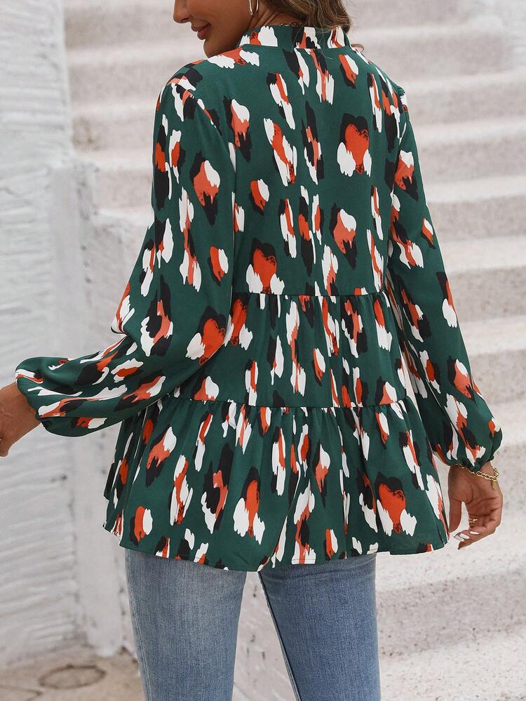 Ladies All-over Ruffled Hem Shirt