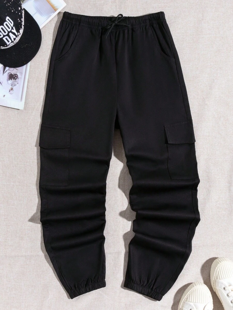 SHEIN Pantalones Tipo Jogger Tipo Cargo Con Bolsillo Utilitario Para Niño Tween Y Puños Elásticos, Se Venden Como 2 Piezas Por Separado - Negro - Ver 1