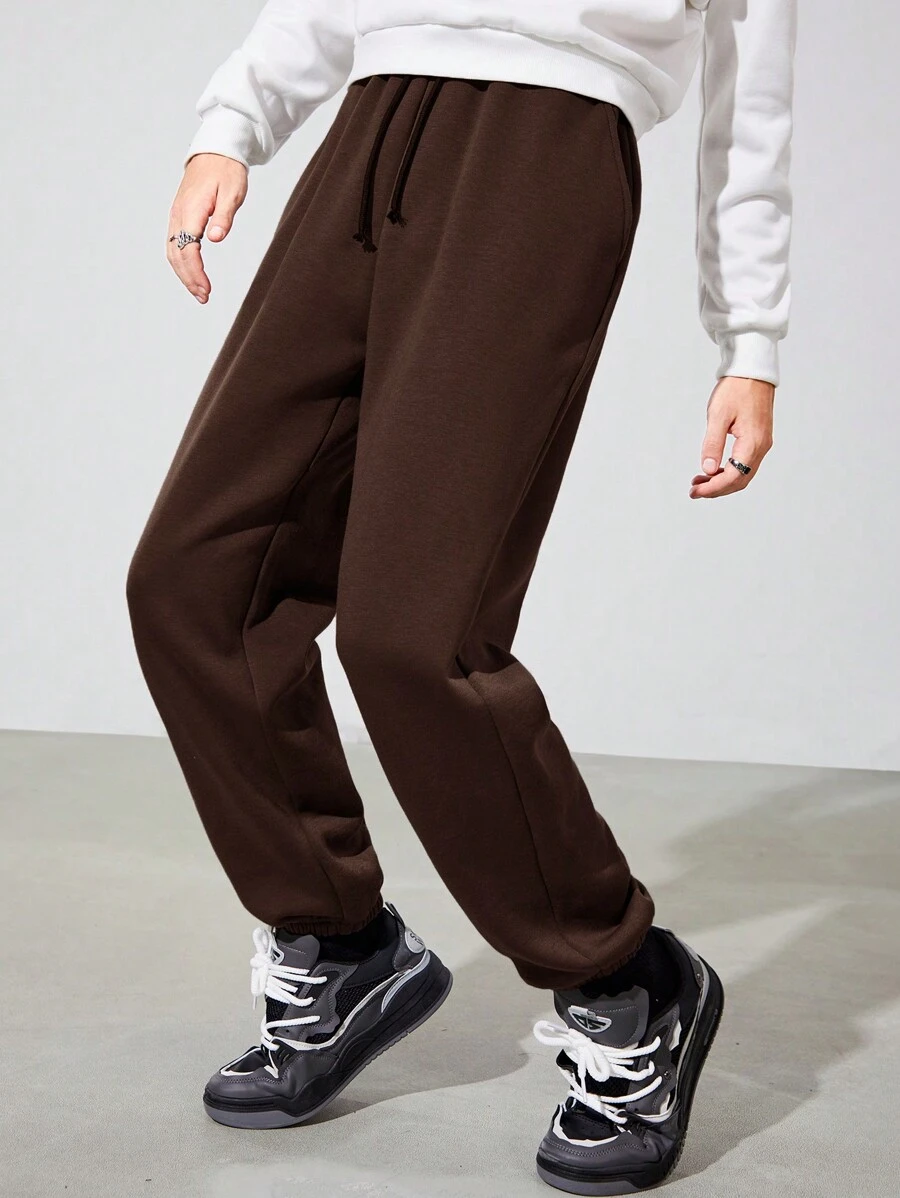 SHEIN Thiếu niên Con trai Giải trí Màu thuần Quần Chạy bộ Với Đàn hồi Cổ tay áo - màu nâu - Xem 1