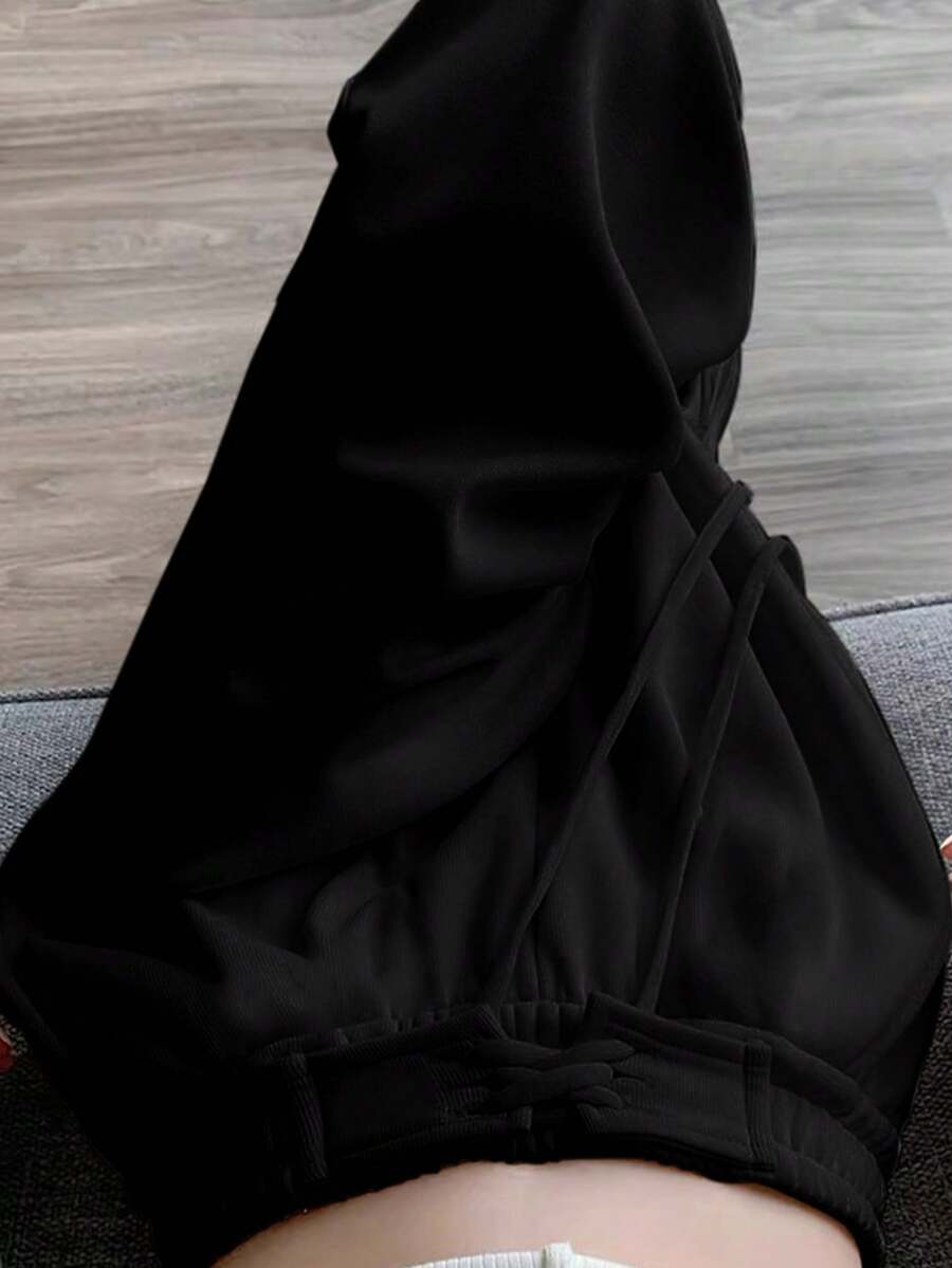 Flirla 大碼純色高腰喇叭褲連身褲,帶繫帶 - 黑色 - 查看 1