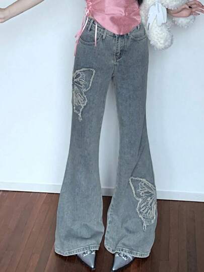 女士流苏蝴蝶贴片弹力腰喇叭阔腿牛仔裤，西部牛仔风休闲春季款