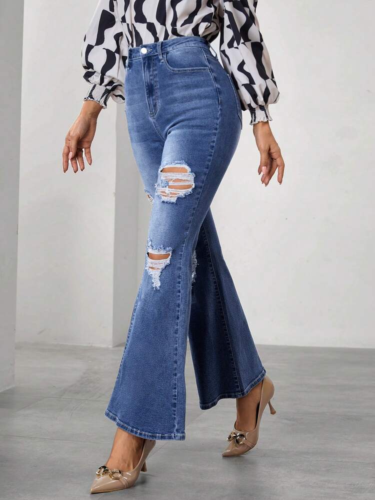 Ladies' Flared Jeans With Distressed Holes