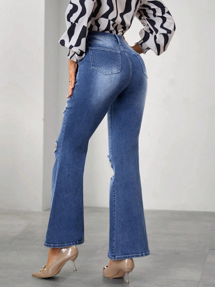 Ladies' Flared Jeans With Distressed Holes